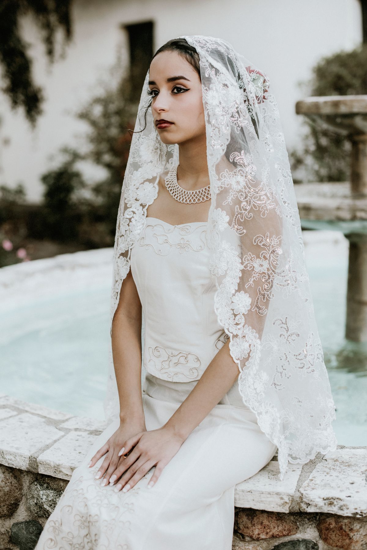 Bride in her wedding dress and veil